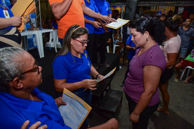 Entrega de Títulos de Propriedade na Comunidade Parque Vitória no Coqueiro